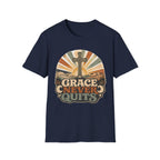 Christian T-Shirt — "Grace Never Quits" Retro Cross Sunrise Tee