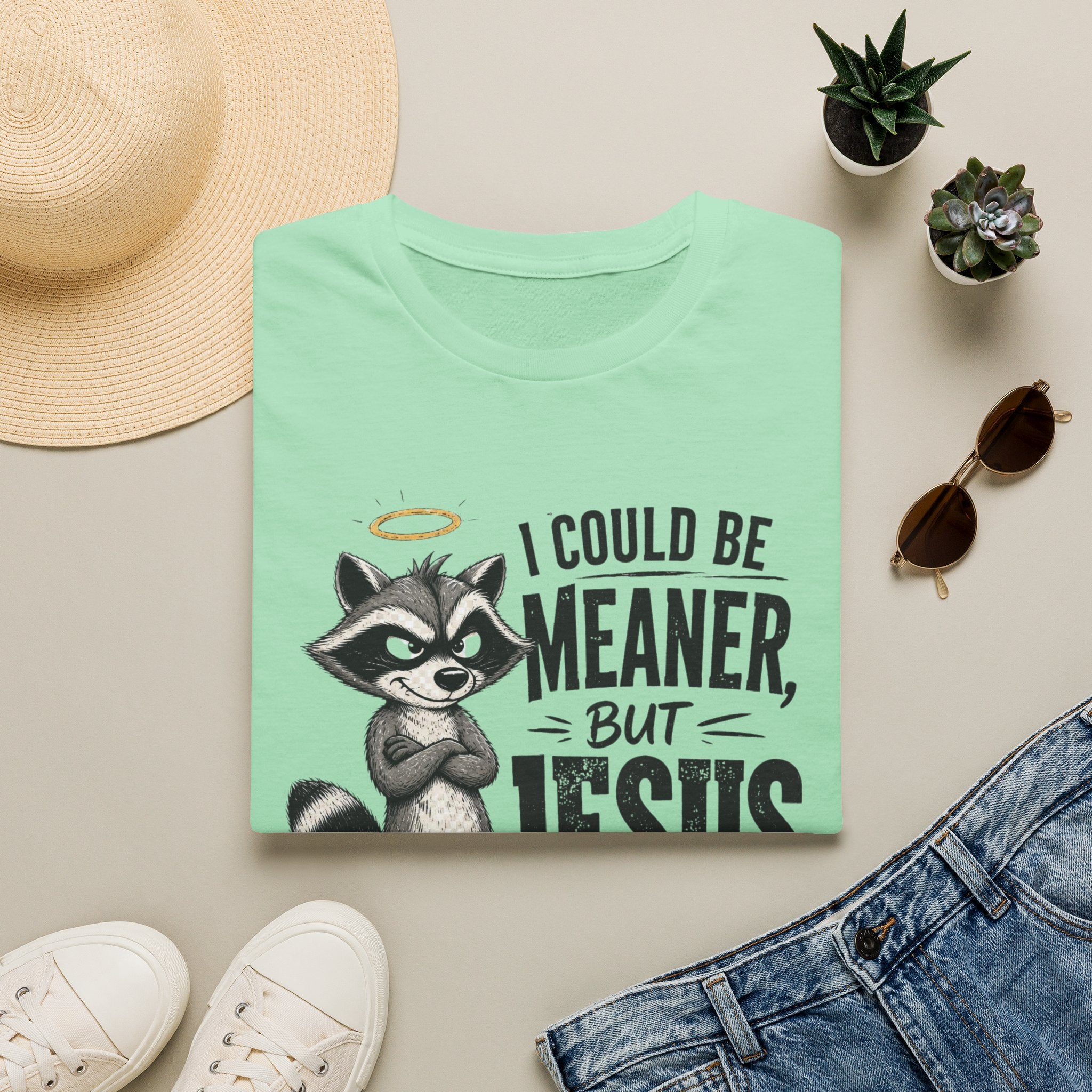 T‑Shirt — "I Could Be Meaner But Jesus Said No" Cute Raccoon Christian Tee