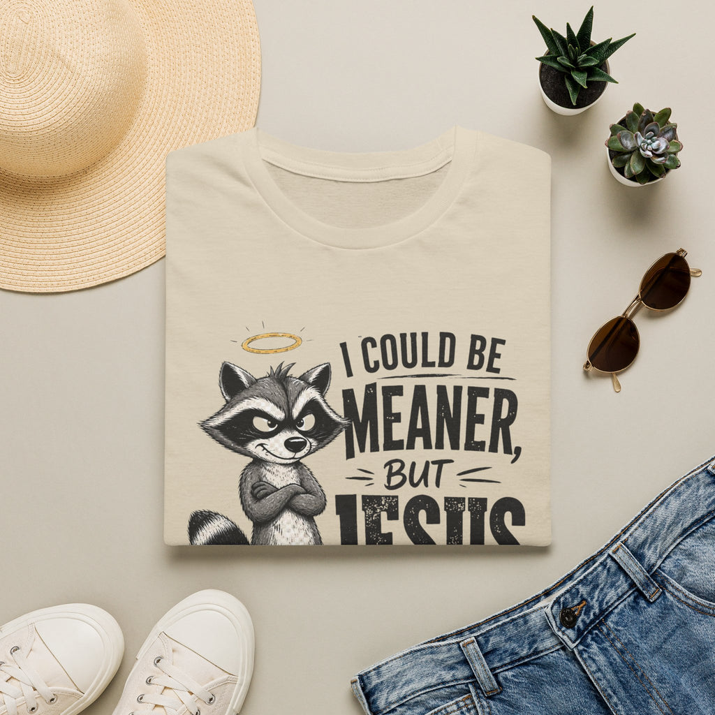 T‑Shirt — "I Could Be Meaner But Jesus Said No" Cute Raccoon Christian Tee